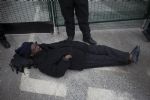 Protector Lies Down in Front of IGas gates